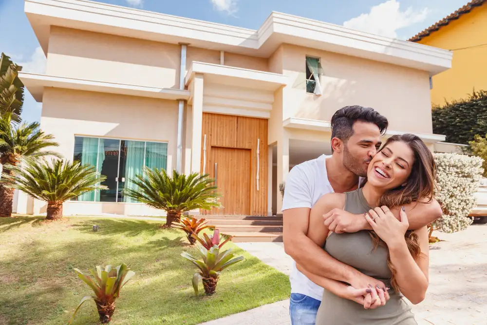 couple front new large modern house outdoors happy achievement couple love with house background1